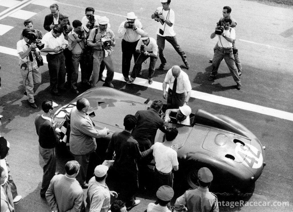 Stirling Moss accepts congratulations upon winning the 1956 Grand Prix of Bari in his works Maserati 300S. Photo: Maserati Archive 