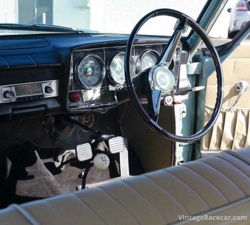 Right-hand-drive car's standard dashboard—even though it has a tachometer—and thin-rimmed steering wheel remind us just how close to stock these cars really were in their day. Photo: Steve Oom