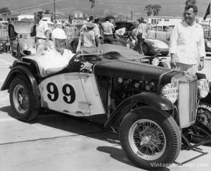 The authorÕs father, Lars Jacobsen, in his MG NA Magnette (#0878) at Santa Barbara on Labor Day weekend 1955; behind is the Von Neumann Monza to be driven by Phil Hill and Richie Ginther. ThatÕs crewman Bill Tyler standing by at right.Photo: Lester Neham 