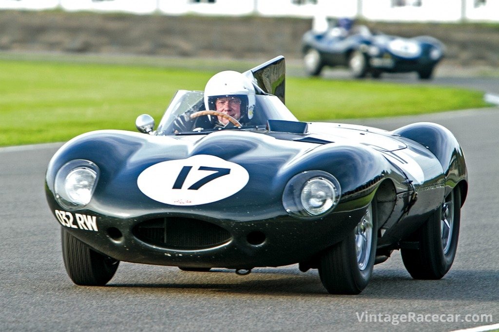 Gary Pearson stretches his and the D-type JaguarÕs legs during a Goodwood Revival.Photo: Roger Dixon 