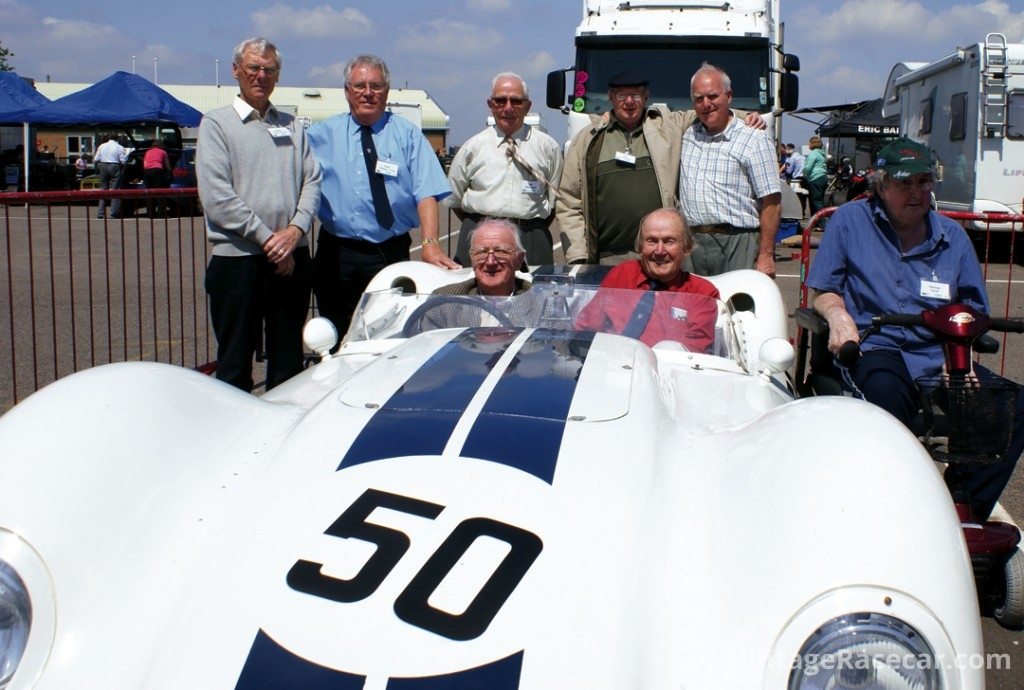 Brian Lister and John Coundley (seated in car), join other former employees during Lister 50th celebrations in 2008. Photo: Mike Jiggle 