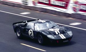 Winning GT40MKII of Bruce McLaren/Chris Amon speeds along the pit straight to complete one of it's 360 laps. Photo: Roger Dixon 