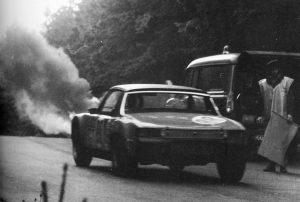  From another position, the photographer captured the arrival of the safety car to the still-burning wreckage of the Huhn/Schwarz car.<br /> Photo: Porsche Werk