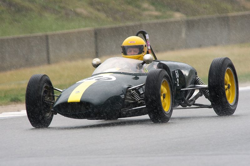 Jim Brown in his Lotus 20. That's hail not rain.