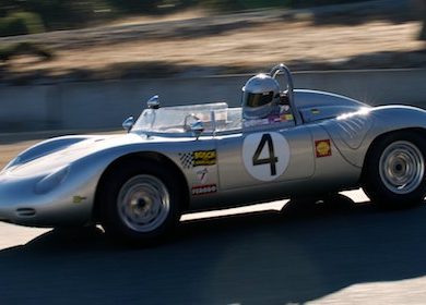 Early Sunday morning sun lights up the 1960 Porsche RS60 driven by Bill Lyon. DennisGray