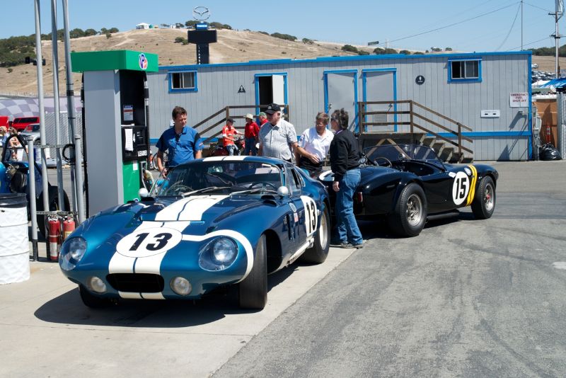 Two Cobras meet at the pumps. DennisGray