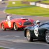 Stirling Moss in the Jaguar C-Type tries to stay clear of the Tojeiro-Bristol