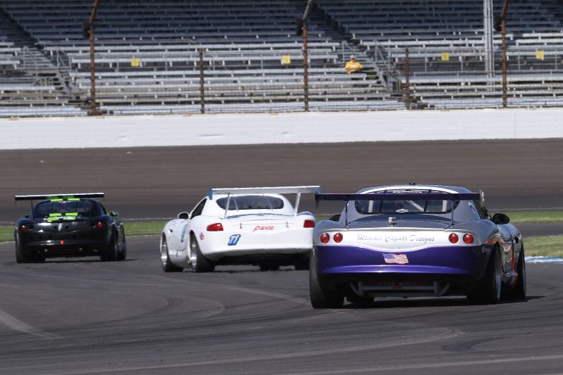 Three Panoz heading to the front straight. Picasa