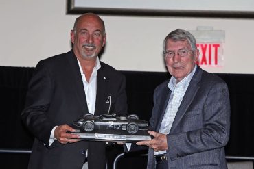 Bobby Rahal (l) presents Vic Elford with the RRDC Phil Hill award for 2015