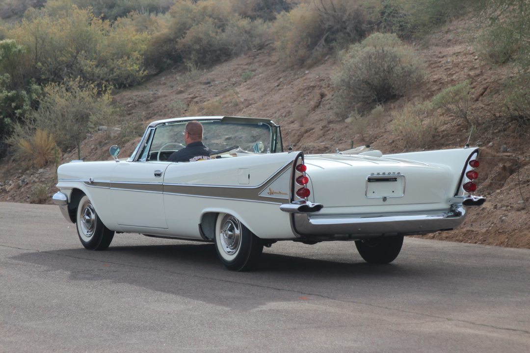 Three-quarter rear view of a white 1958 DeSoto Adventurer