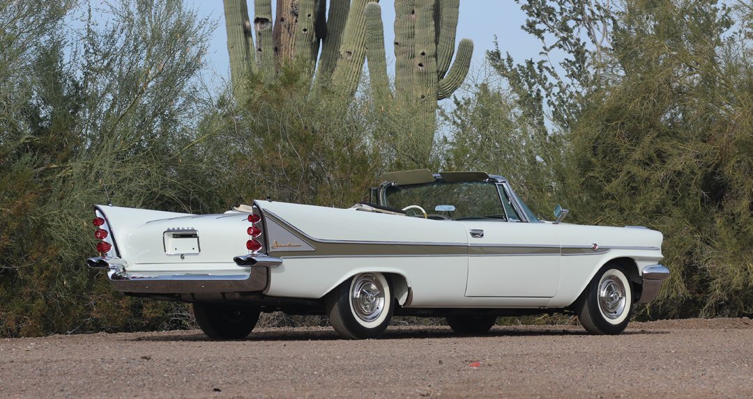 Three-quarter review view of a 1958 white DeSoto Adventurer