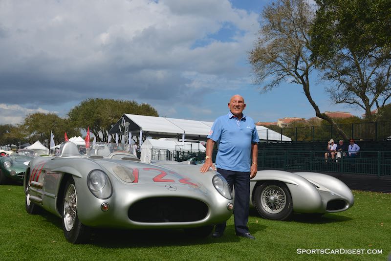 Stirling Moss with the Mercedes-Benz 300 SLR that he drove to overall victory at the 1955 Mille Miglia