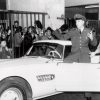 Elvis Presley in front of his BMW 507