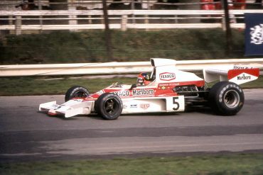 Emerson Fittipaldi in the McLaren M23 at the 1974 British Grand Prix