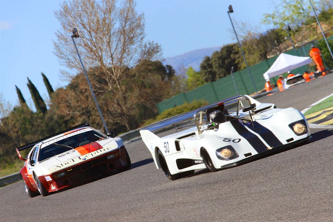 The 1979 BMW M1 chases down the 1976 T286 DFV