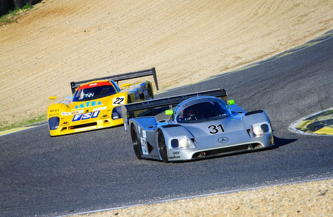 The 1989 Mercedes-Benz C11 leads going through a bend during The Jarama Classic 2017