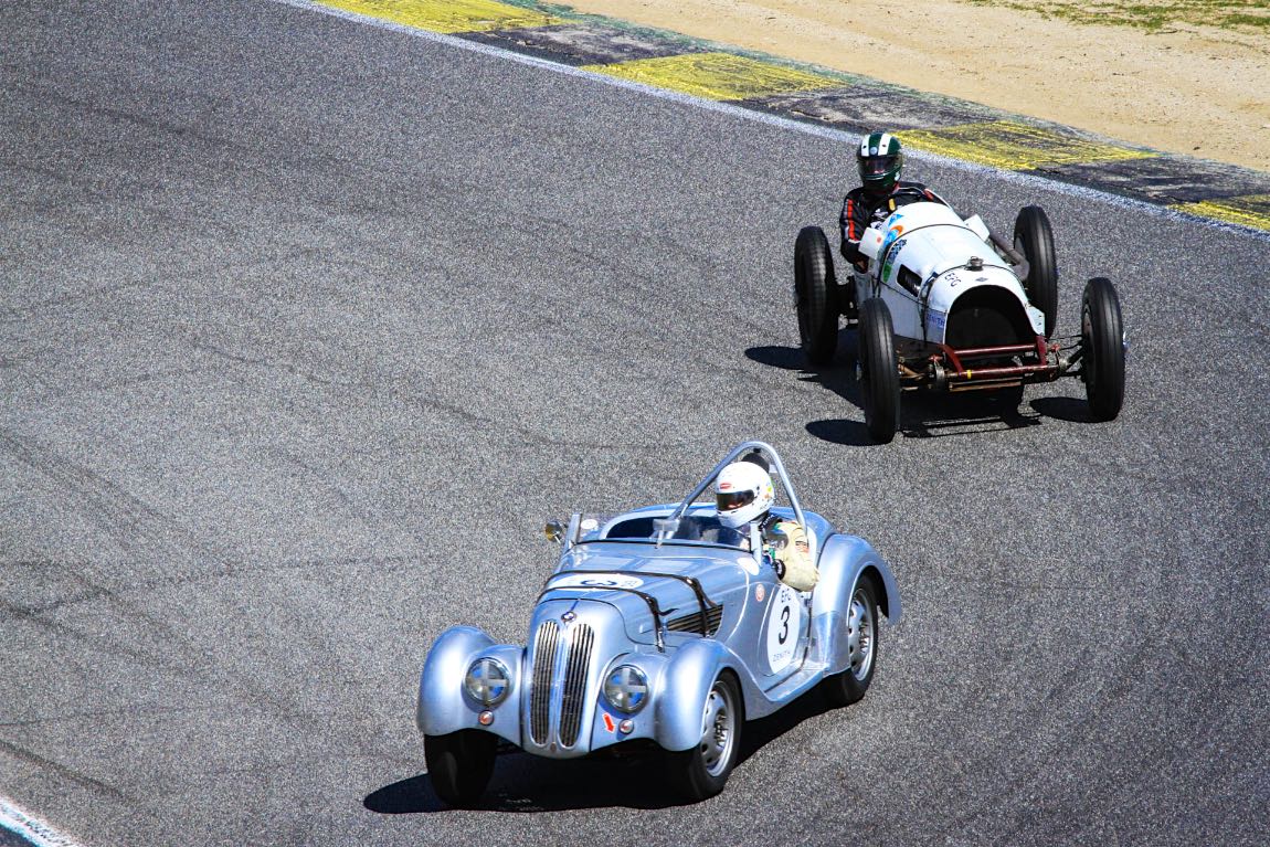 1939 BMW 328 Roadster leads the 1935 Riley Dobbs