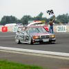 German Touring Car Championship, Diepholz Airfield Race, 16 August 1992. Klaus Ludwig (start number 3) won both races at the wheel of an AMG-Mercedes 190 E 2.5-16 Evolution II racing tourer and is here seen crossing the finishing line in first place.  Daimler AG