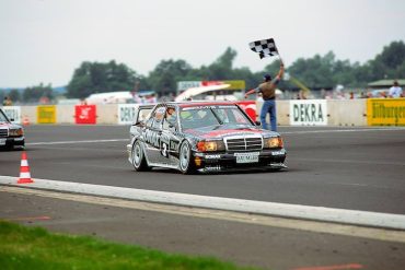 German Touring Car Championship, Diepholz Airfield Race, 16 August 1992. Klaus Ludwig (start number 3) won both races at the wheel of an AMG-Mercedes 190 E 2.5-16 Evolution II racing tourer and is here seen crossing the finishing line in first place.  Daimler AG