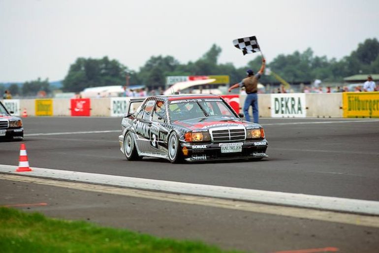 German Touring Car Championship, Diepholz Airfield Race, 16 August 1992. Klaus Ludwig (start number 3) won both races at the wheel of an AMG-Mercedes 190 E 2.5-16 Evolution II racing tourer and is here seen crossing the finishing line in first place.  Daimler AG