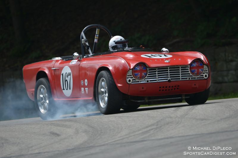 Michael Moore, with a slight lock up, 1962 Triumph TR4. Michael Casey-DiPleco