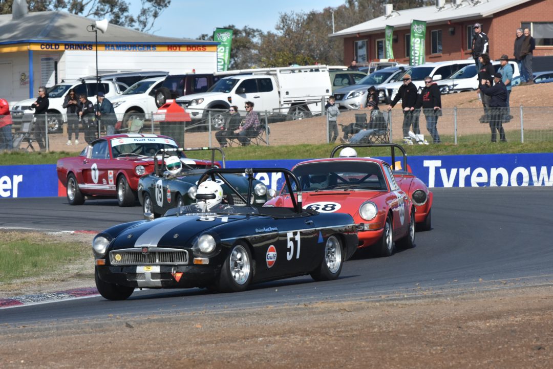 Kent Brown in his MGB leading the Porsche 911 of Andrew Begg.
