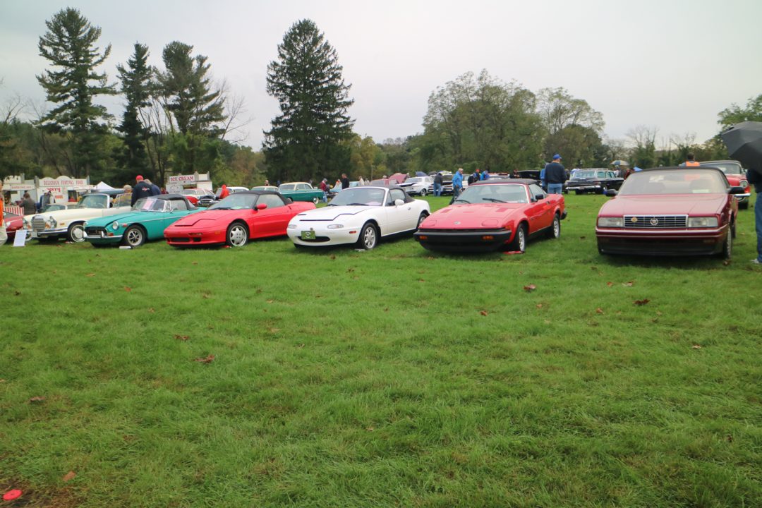 An interesting assortment of sports and sporty cars, from a Cadillac to a Mercedes with three Brits and a Miata in between.