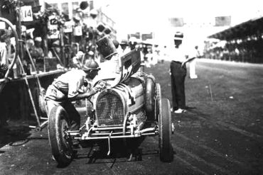 Tazio Nuvolari drives a Bugatti 35C to his first international win (1928).