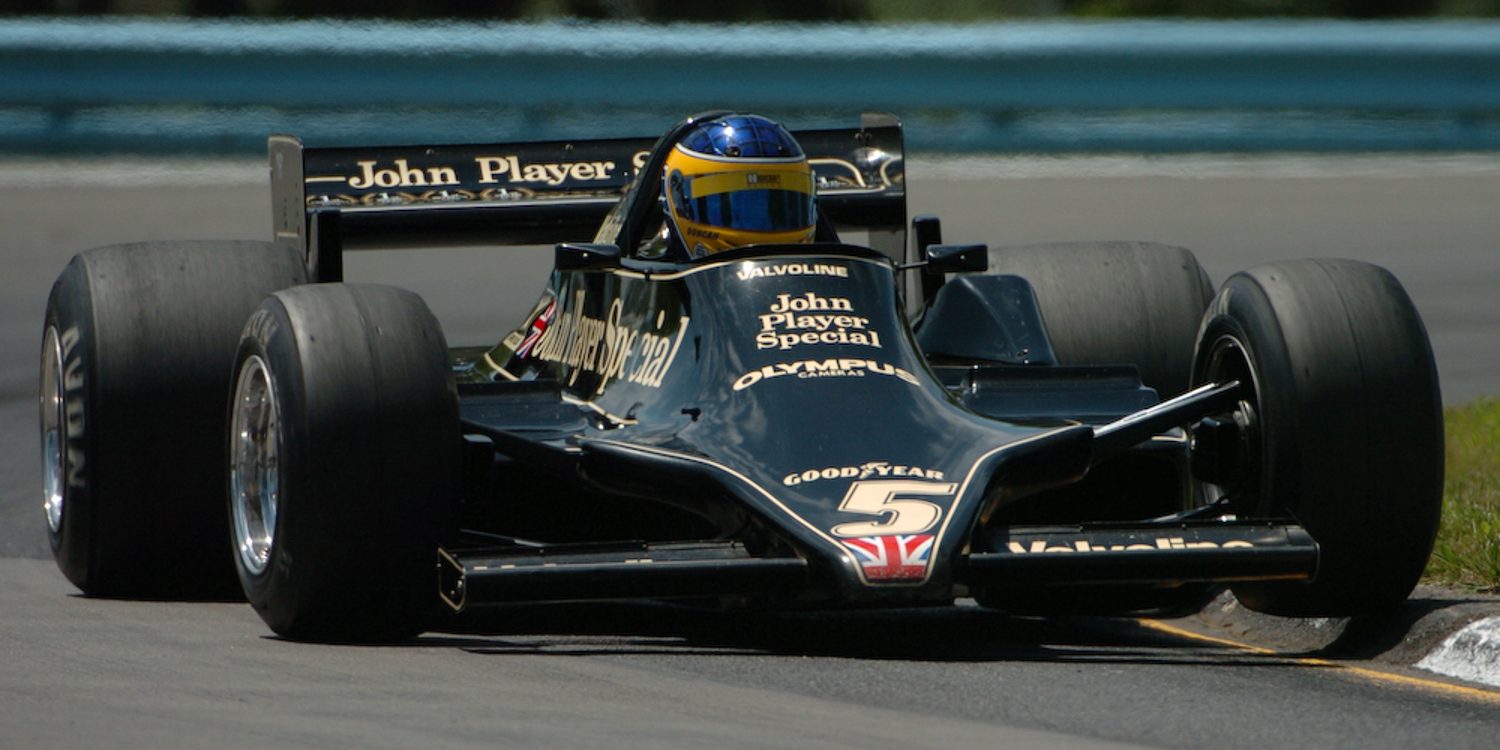 Duncan Dayton, rides up on the curbing in Mario Andretti's 1978 Lotus 79.