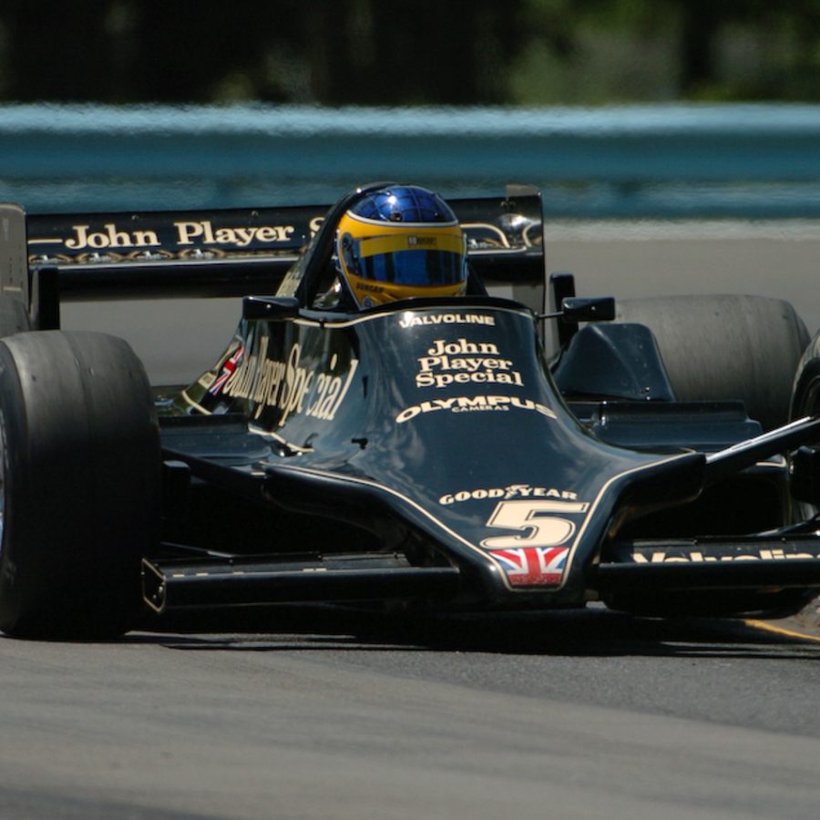 Duncan Dayton, rides up on the curbing in Mario Andretti's 1978 Lotus 79.