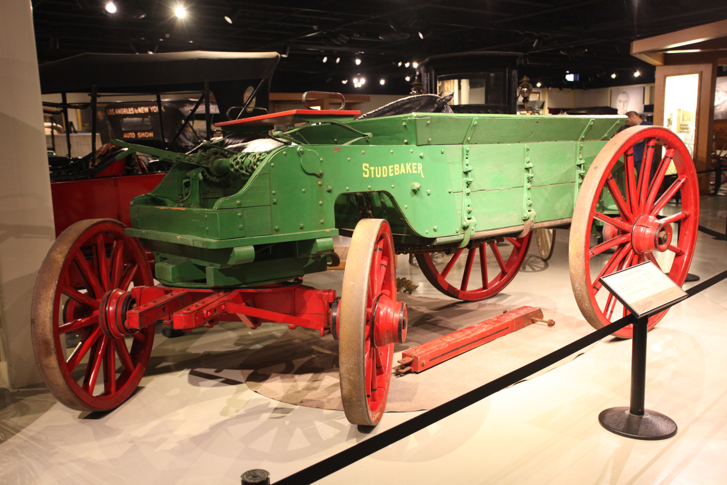 Green Studebaker workwagon with Studebaker in yellow letters. 