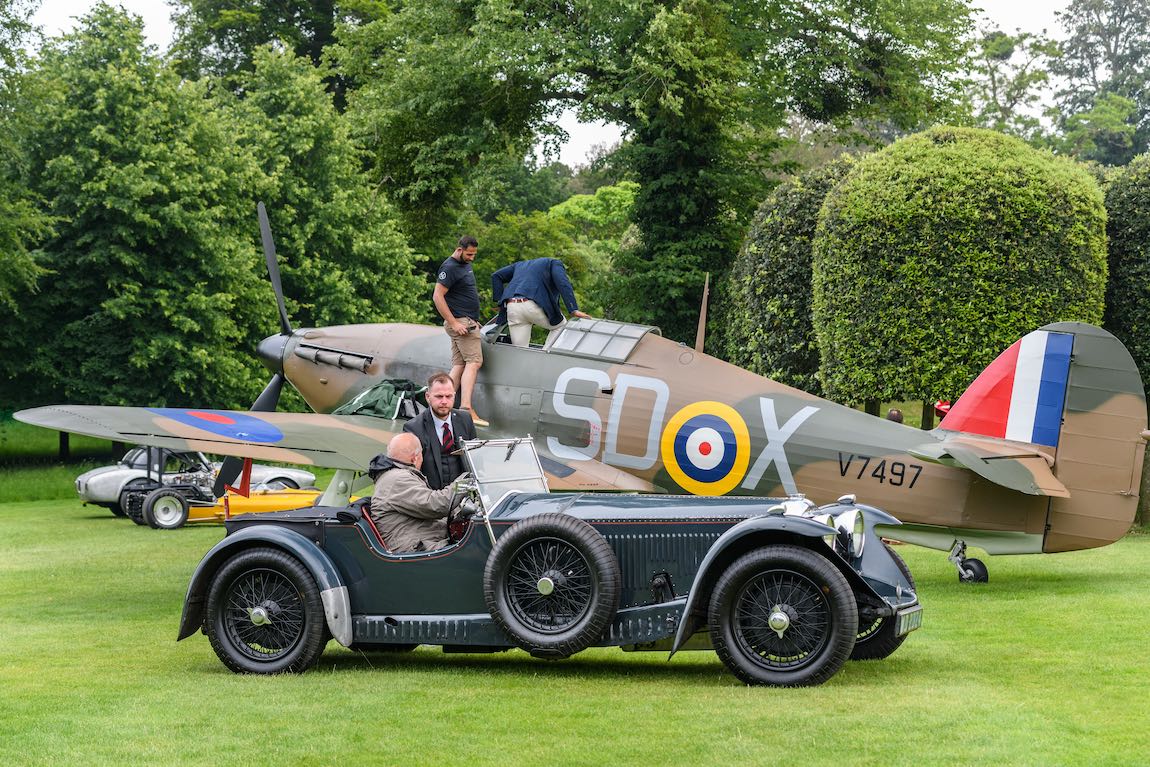 Aircraft Restoratation Company's Hawker Hurriance with the 1931 Invicta 4.5 Litre Low-Chassis S-Type by Vanden Plas in foreground (Credit TIME SCOTT) TIM SCOTT