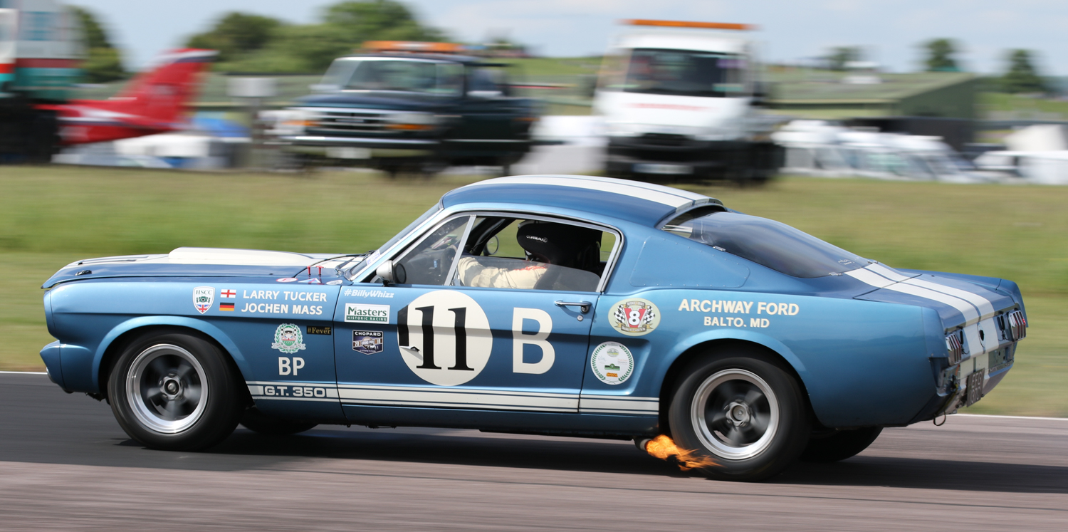 Larry Tucker on the overrun in his 1965 Shelby Mustang GT350R. Picasa