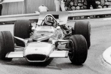 Graham Hill drives Lotus 49 to victory in the Monaco Grand Prix (1969).