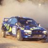 Colin McRae in the Subaru Impreza Group A rally car built by Prodrive