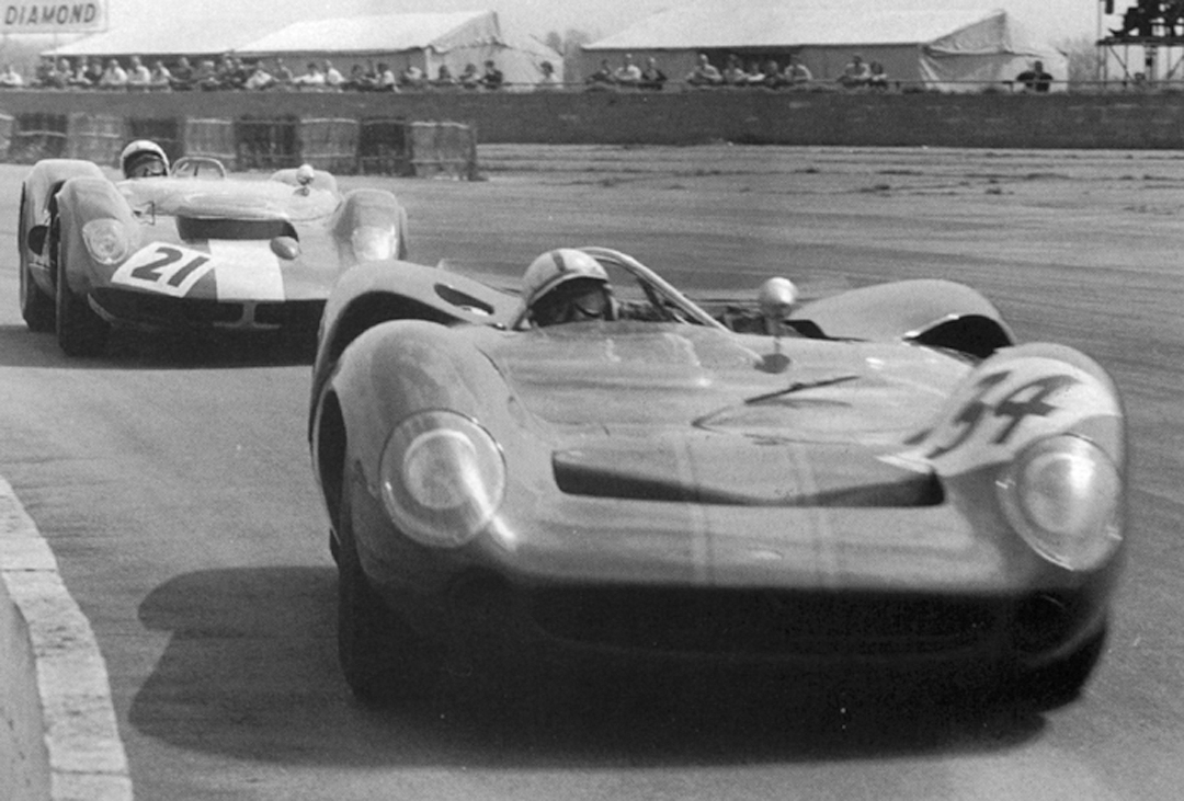 The Lola T70 spyder makes its race debut at Silverstone, England (1965).