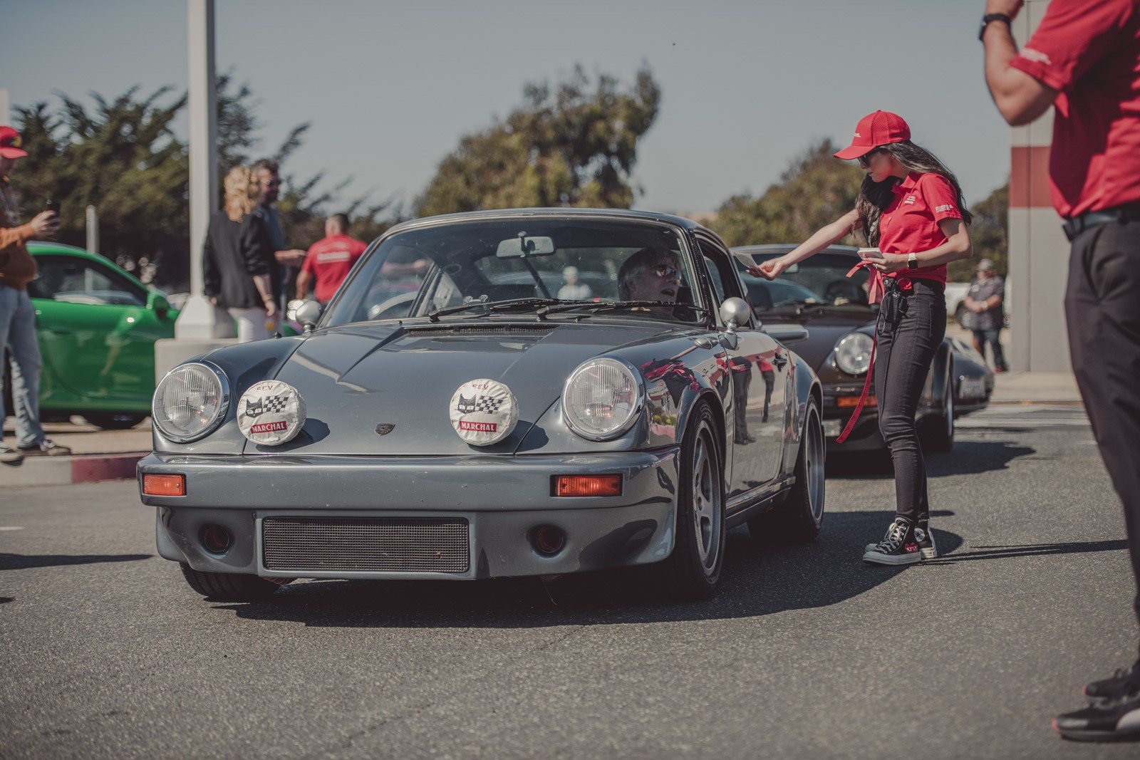 Porsche Classic show participants pulling in to park