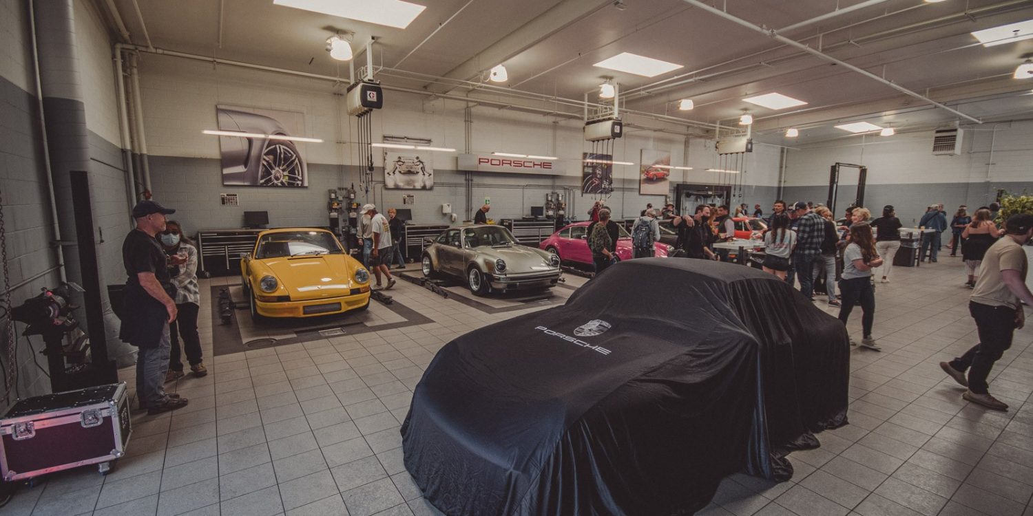 Porsche Monterey service bay filled with a variety of 911's