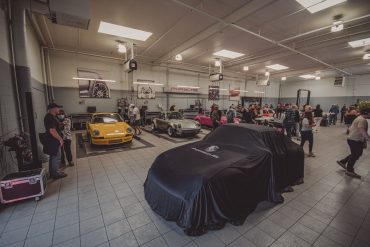 Porsche Monterey service bay filled with a variety of 911's