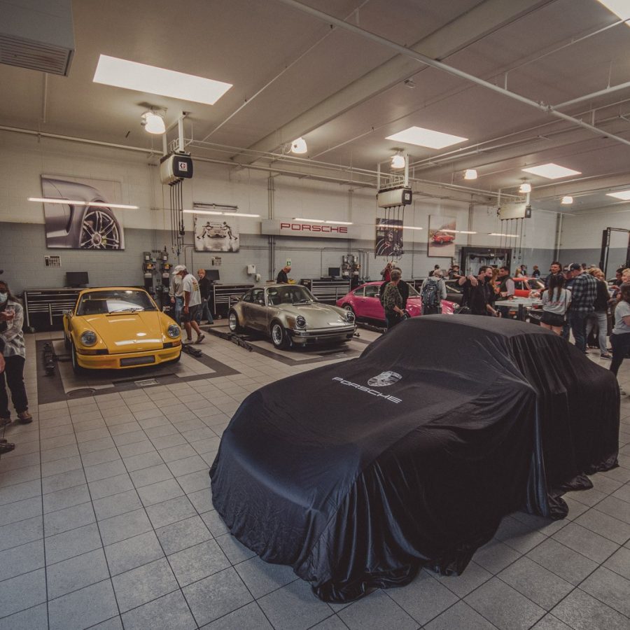 Porsche Monterey service bay filled with a variety of 911's