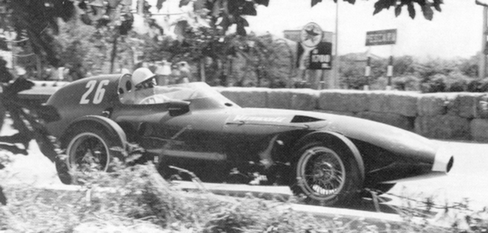 Stirling Moss drives a Vanwall to victory in the Pescara Grand Prix (1957).