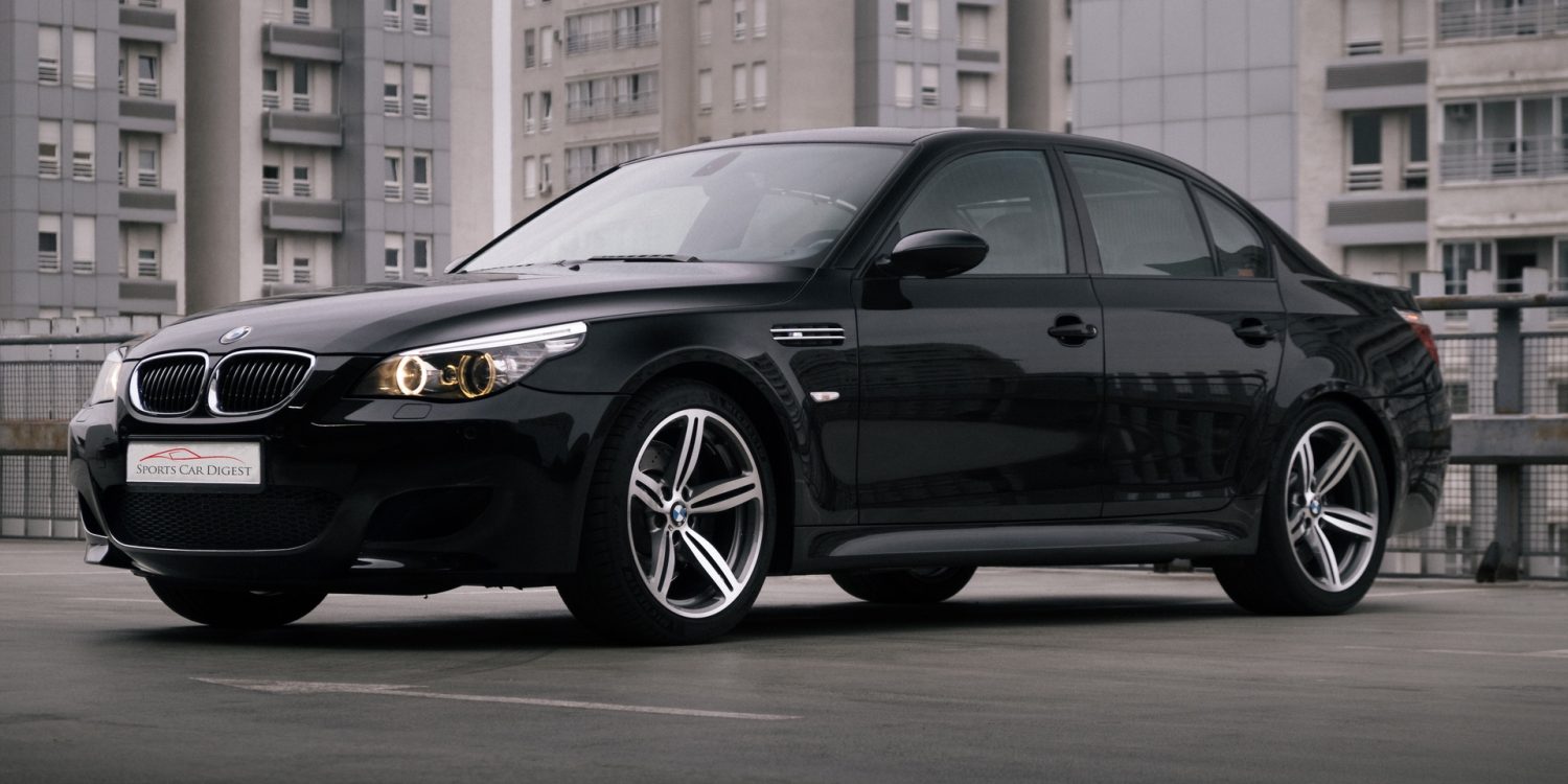 Front view of BMW M5 E60 on rooftop in city