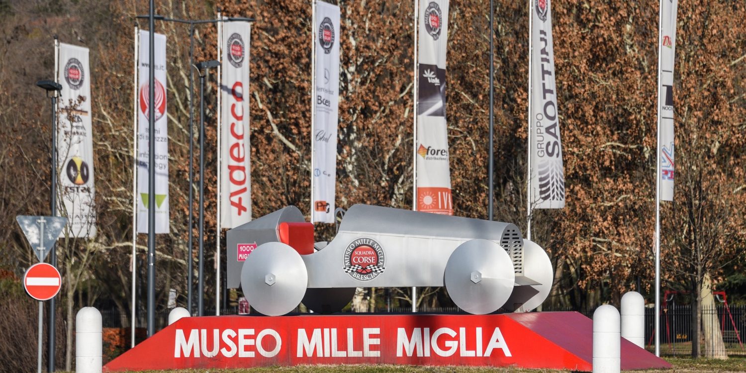 Sign and sculpture outside Mille Miglia Museum