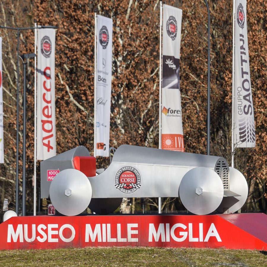 Sign and sculpture outside Mille Miglia Museum