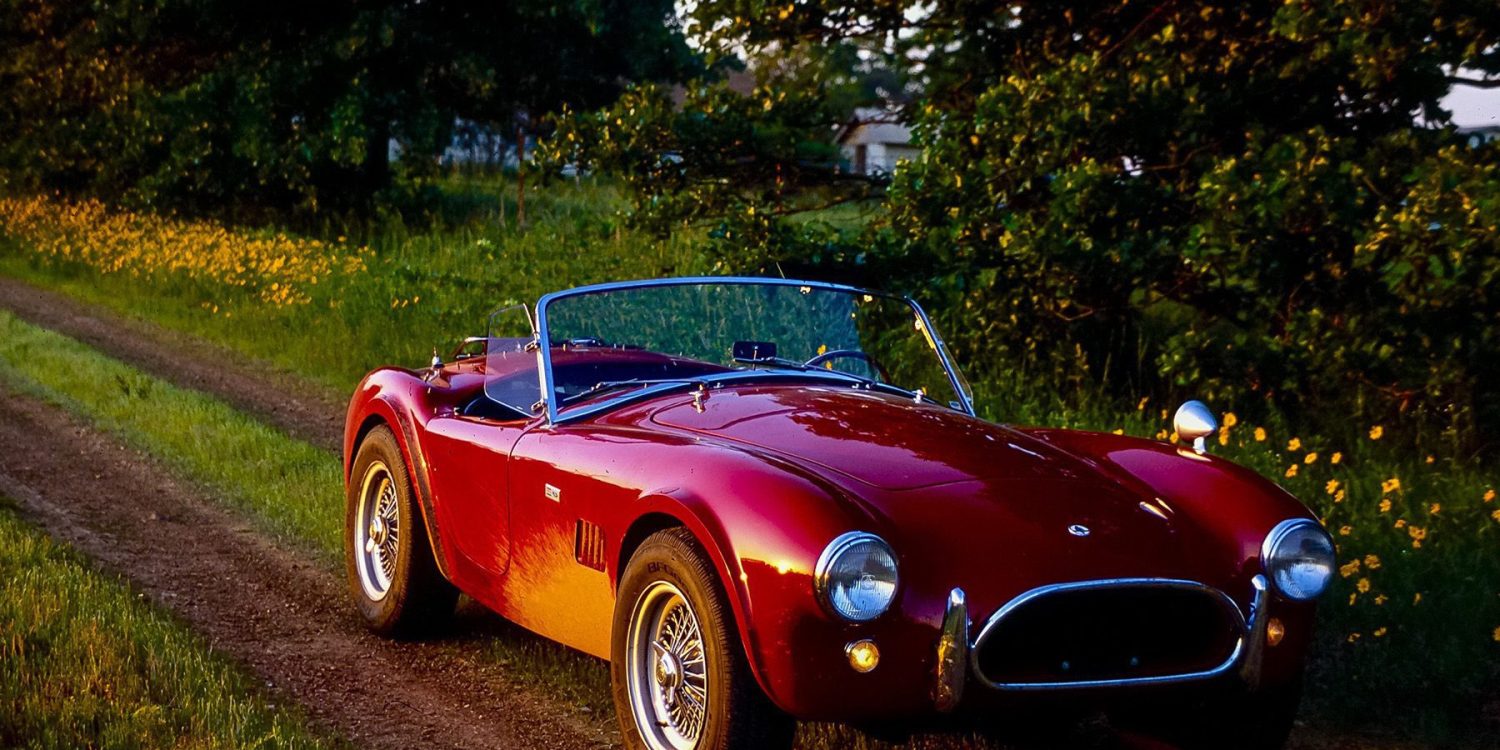 Tom Cotter's Ford Cobra on dirt road in country