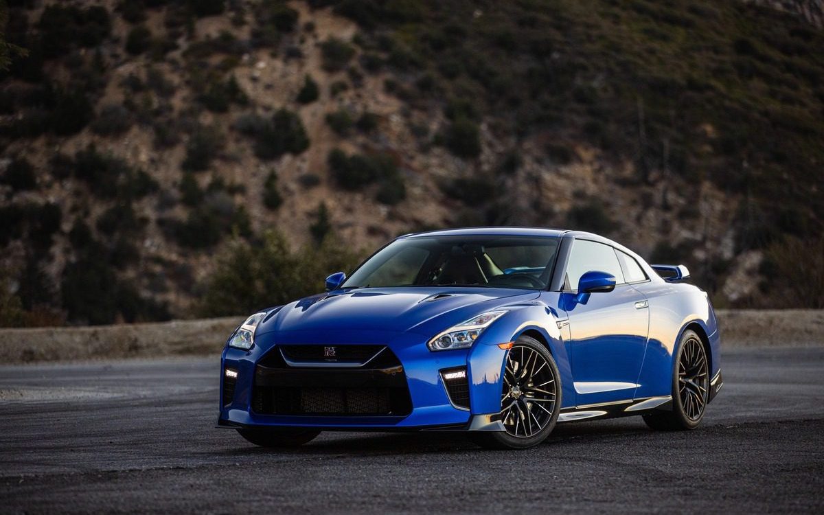 Blue Nissan GT-R R35 on road