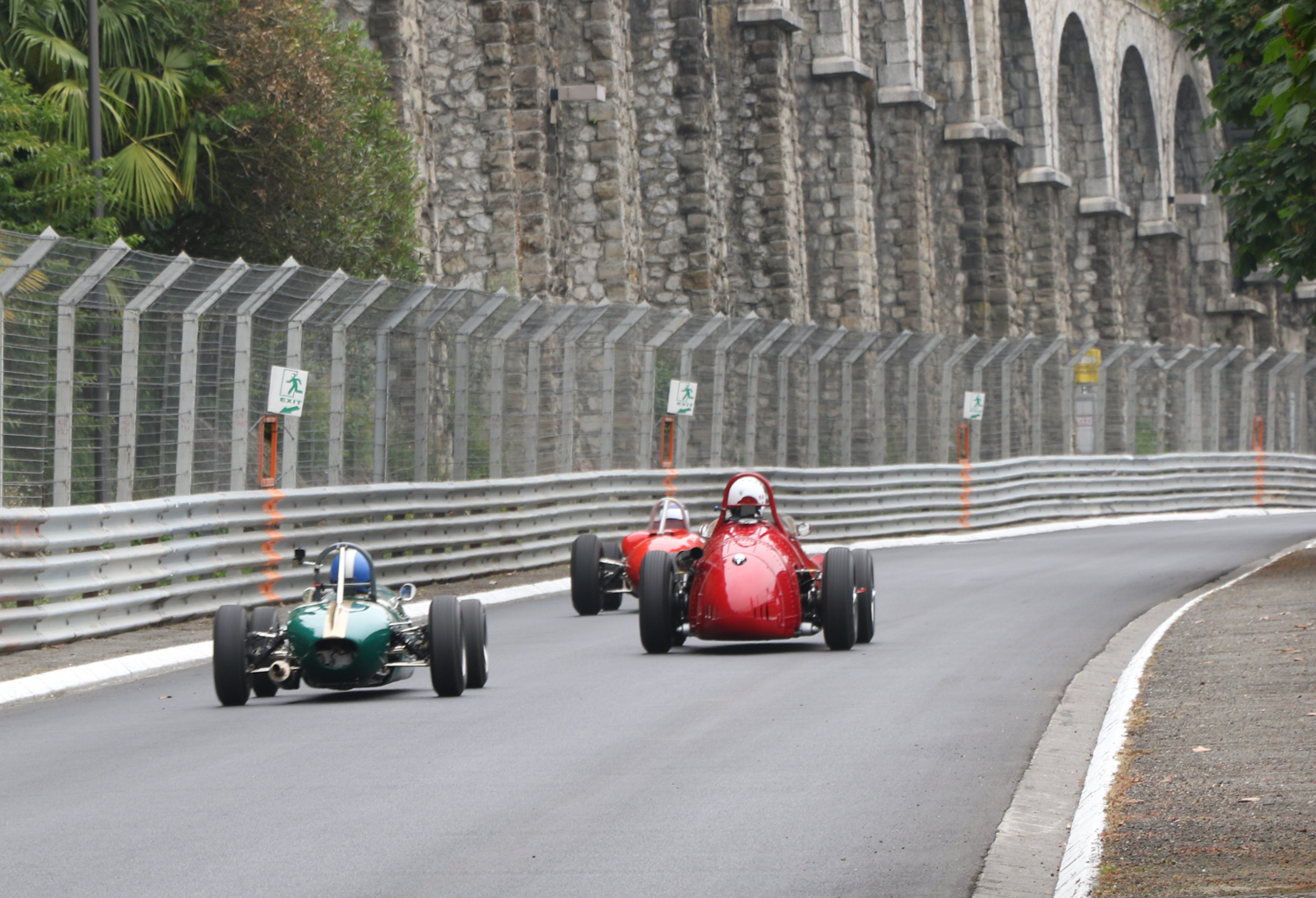 MASERATI 250F AMONG YOUNGER BRABHAMS UNDER THE BOULEVARD DES PYRENEES. Picasa