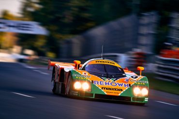 Mazda 787B accelerating out of Indianapolis.