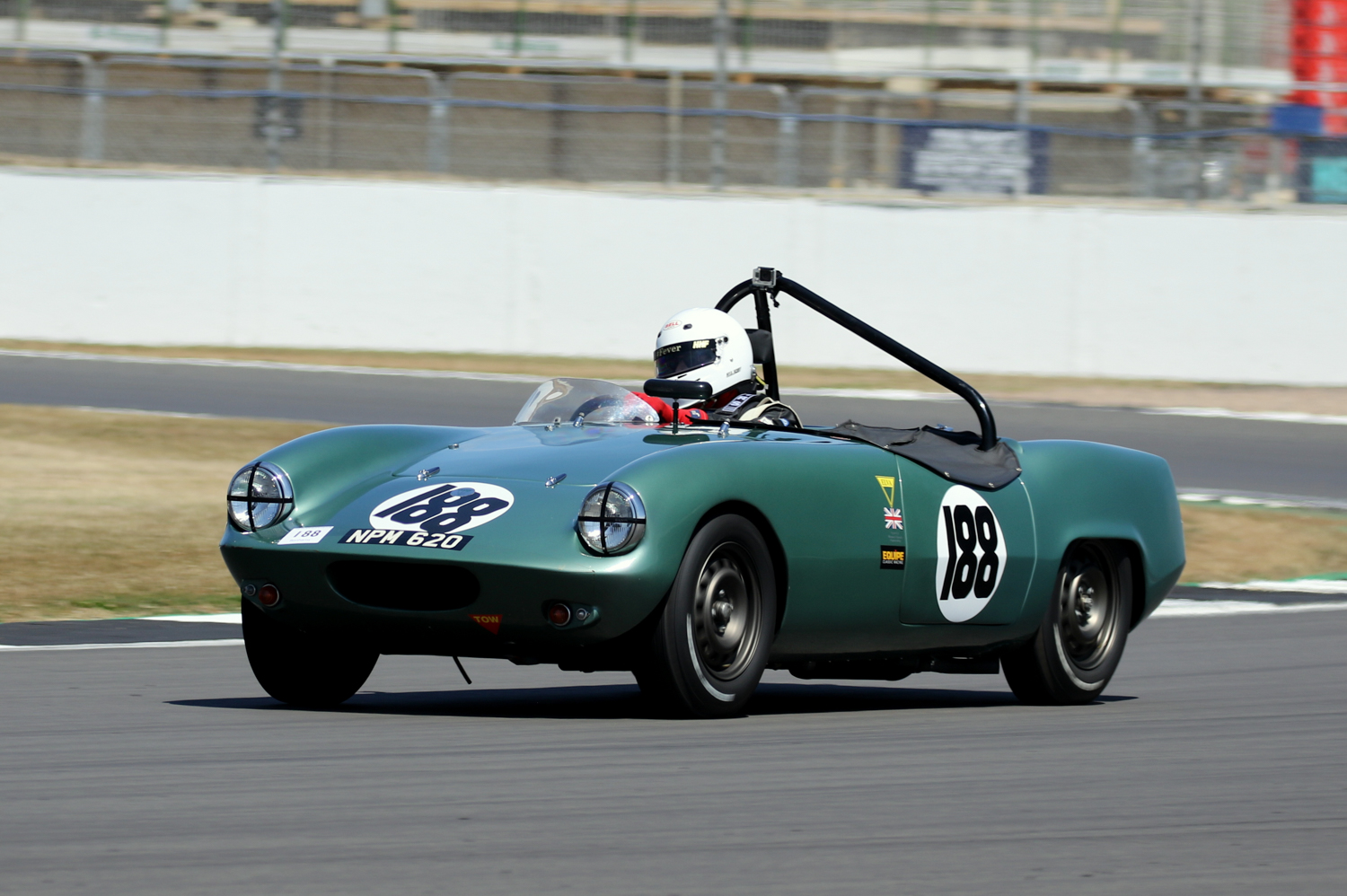 PAUL WOOLMER'S ELVA COURIER CAME HOME A FINE 4th in the 1950s SPORTS CAR RACE. Picasa