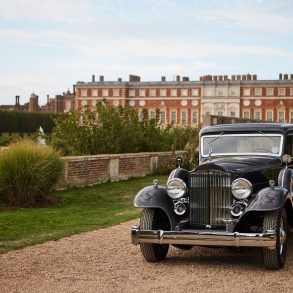 Packard Twelve in front of Hampton Court Palace.